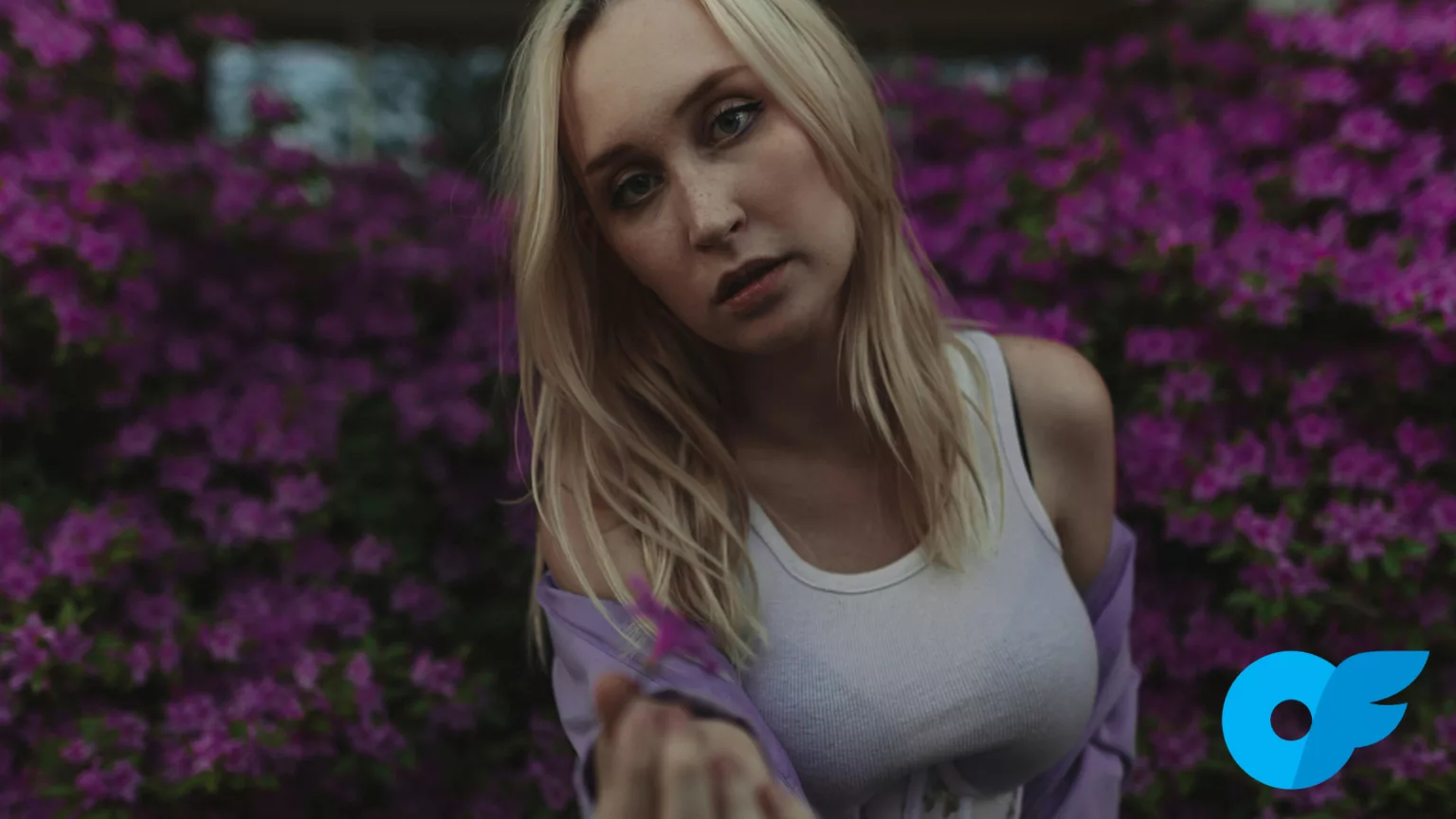 OnlyFans model with flowers in background